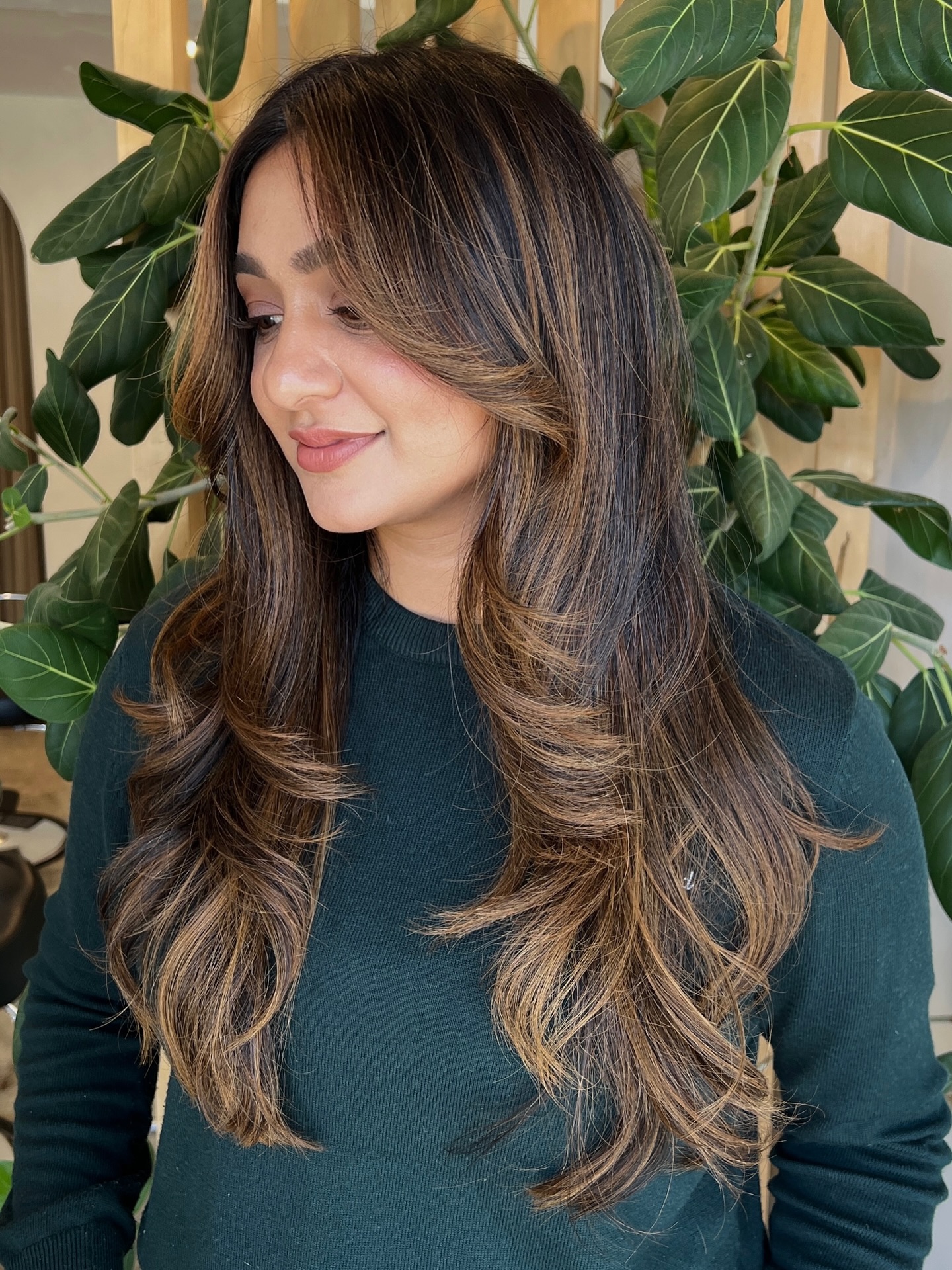 Glossy brunette hair with dimensional color